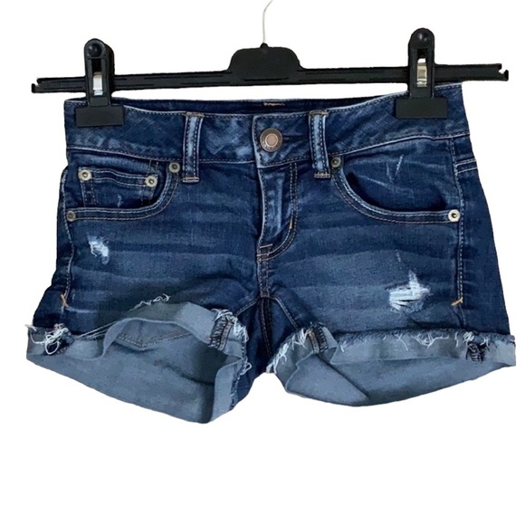 American Eagle Super Stretch blue denim distressed shorts Size 00 - Picture 1 of 10
